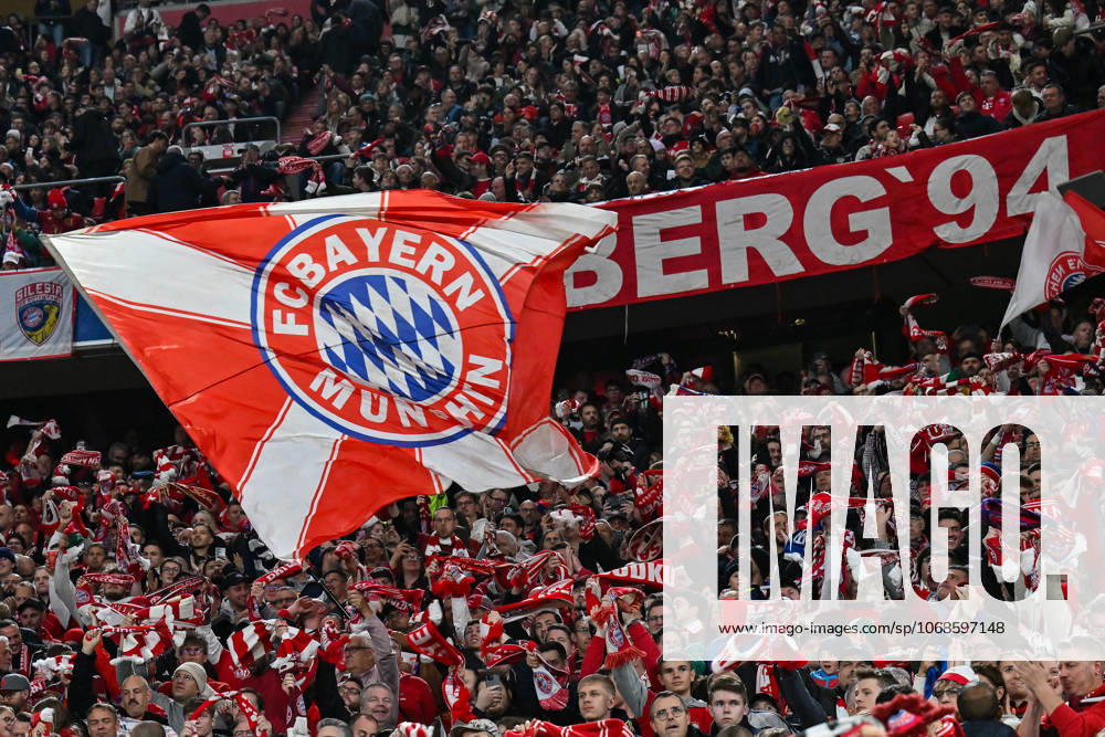 Bundesliga FC Bayern Munich Bayer 04 Leverkusen 01 11 2025 MUNICH, GERMANY 1 NOVEMBER Fans of FC Bayern with flag in the stadium, joy, cheering, symbolic picture during the Bundesliga match between FC Bayern Munich and Bayer 04 Leverkusen on matchday 9 at Allianz Arena on November 1, 2025 in Munich, Germany DFL REGULATIONS PROHIBIT ANY USE OF PHOTOGRAPHS AS IMAGE SEQUENCES AND OR QUASI VIDEO
