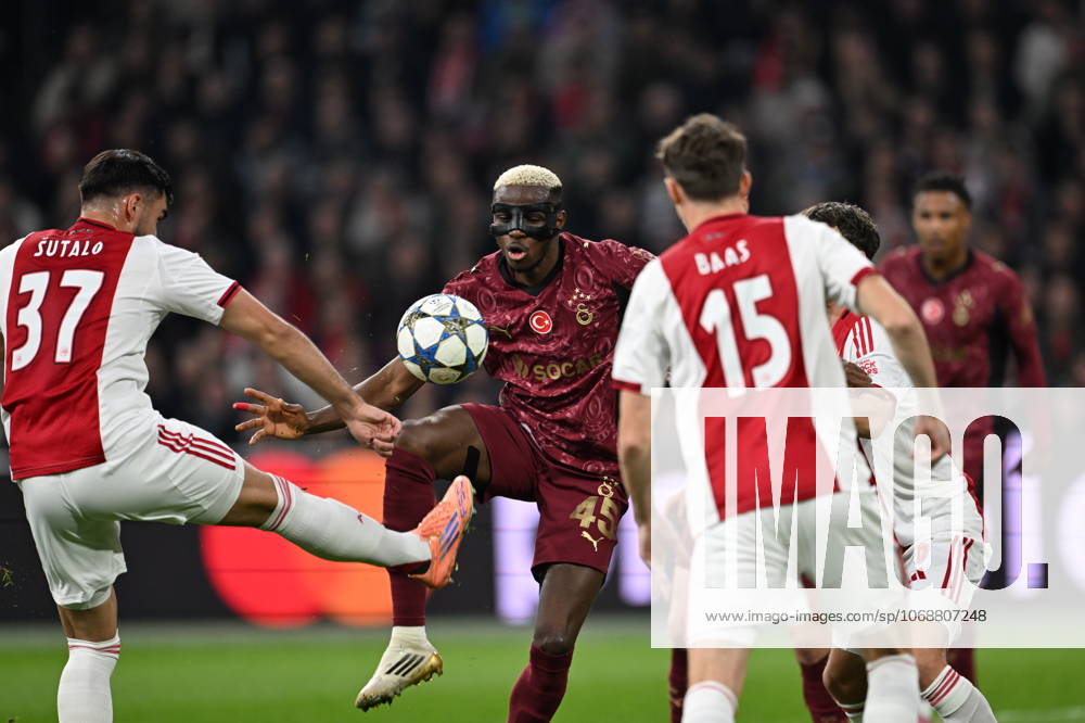 Ajax v Galatasaray - UEFA Champions League AMSTERDAM, NETHERLANDS - NOVEMBER 05: Victor Osimhen (45) of Galatasaray in action against Josip Sutalo (37) and Youri Baas (15) of Ajax during the UEFA Champions League week 4 football match between Ajax and Galatasaray at Johan Cruijff Arena in Amsterdam, Netherlands on November 05, 2025. Halil Sagirkaya Anadolu Amsterdam Netherlands. Editorial use only. Please get in touch for any other usage.