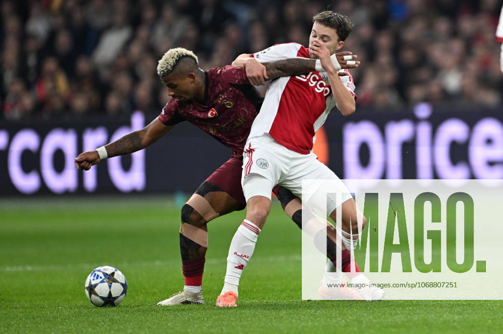 Ajax v Galatasaray - UEFA Champions League AMSTERDAM, NETHERLANDS - NOVEMBER 05: Mario Lemina (99) of Galatasaray in action against Youri Regeer (6) of Ajax during the UEFA Champions League week 4 football match between Ajax and Galatasaray at Johan Cruijff Arena in Amsterdam, Netherlands on November 05, 2025. Halil Sagirkaya Anadolu Amsterdam Netherlands. Editorial use only. Please get in touch for any other usage.