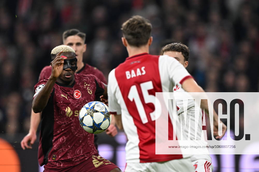 Ajax v Galatasaray - UEFA Champions League AMSTERDAM, NETHERLANDS - NOVEMBER 05: Victor Osimhen (45) of Galatasaray in action against Youri Baas (15) of Ajax during the UEFA Champions League week 4 football match between Ajax and Galatasaray at Johan Cruijff Arena in Amsterdam, Netherlands on November 05, 2025. Halil Sagirkaya Anadolu Amsterdam Netherlands. Editorial use only. Please get in touch for any other usage.