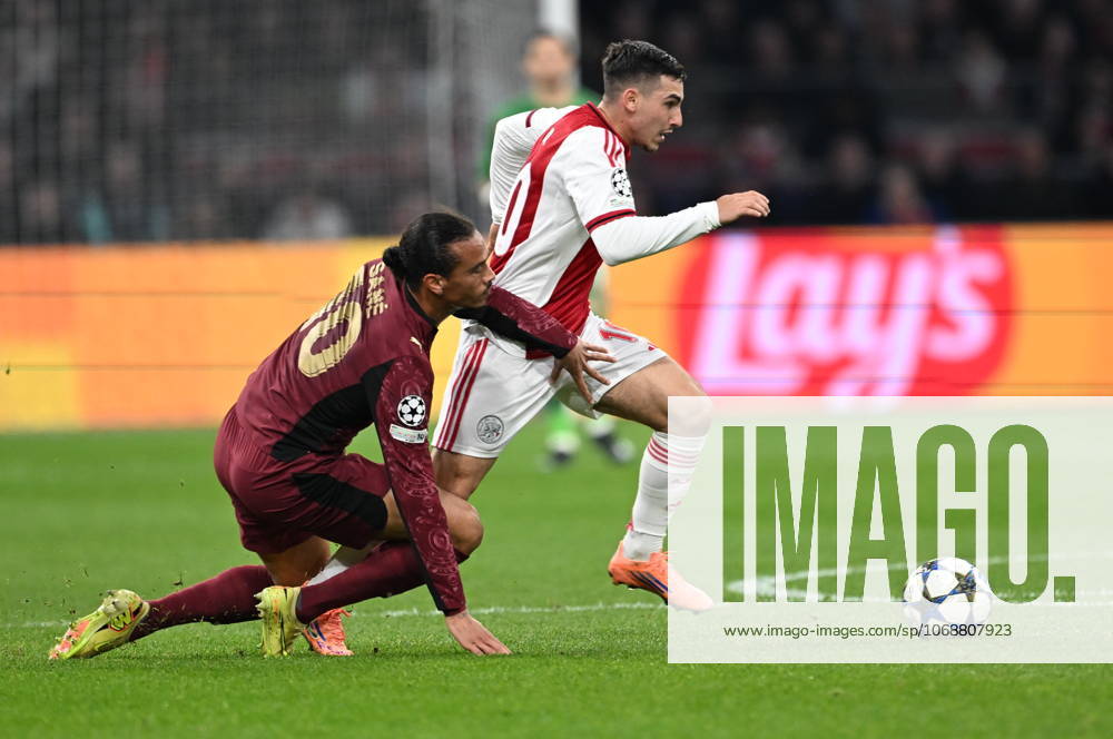 Ajax v Galatasaray - UEFA Champions League AMSTERDAM, NETHERLANDS - NOVEMBER 05: Leroy Sane (L) of Galatasaray in action against Oscar Gloukh (R) of Ajax during the UEFA Champions League week 4 football match between Ajax and Galatasaray at Johan Cruijff Arena in Amsterdam, Netherlands on November 05, 2025. Halil Sagirkaya Anadolu Amsterdam Netherlands. Editorial use only. Please get in touch for any other usage.