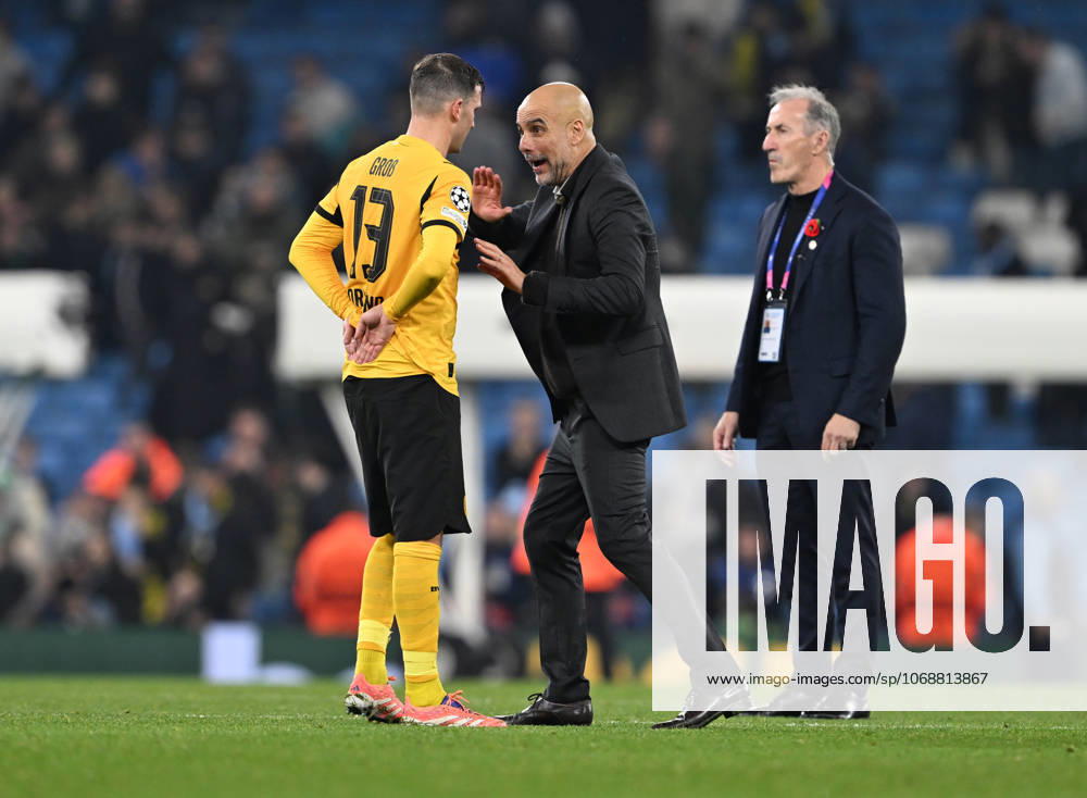 Manchester, England, 5th November 2025. Pep Guardiola coach of Manchester City coaching Pascal Gross of Borussia Dortmund on the final whistle during the Manchester City vs Borussia Dortmund UEFA Champions League match at the Etihad Stadium, Manchester. Picture credit should read: Cody Froggatt Sportimage . SPI_066_CF_Man_City_Dortmund SPI-4268-0128