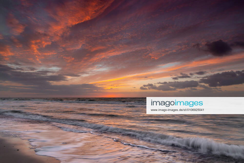 Europe Germany Mecklenburg Vorpommern Baltic Sea Sunset at the Baltic Sea coast near Ahrenshoop on the peninsula Fischland Darß