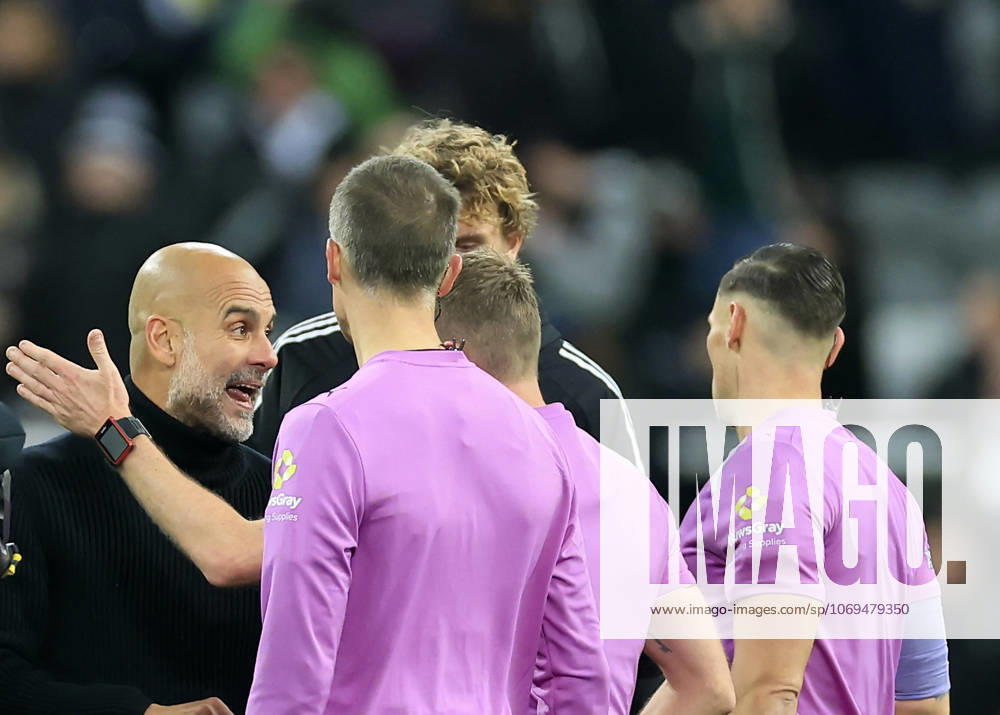 Newcastle United v Manchester City Premier League Pep Guardiola Manchester City Manager (left) speaks with match officials at full time during the Premier League match at St. James s Park, Newcastle UK Newspapers OUT