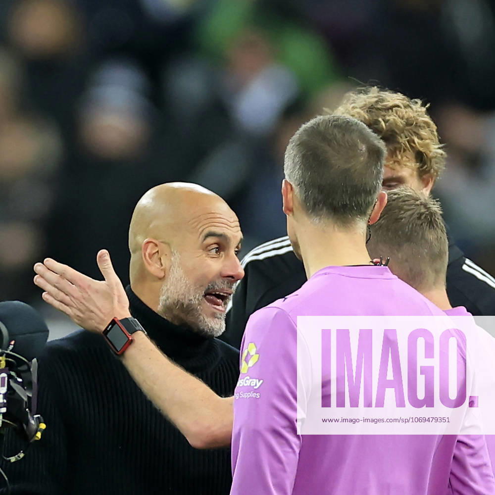 Newcastle United v Manchester City Premier League Pep Guardiola Manchester City Manager (left) speaks with match officials at full time during the Premier League match at St. James s Park, Newcastle UK Newspapers OUT
