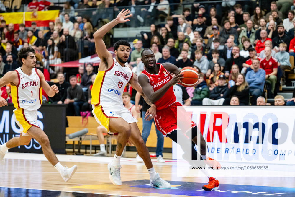 Denmark v Spain, FIBA World Cup 2027 European Qualifiers, Farum, Denmark Farum, Denmark. 27th, November 2025. Bakary Dibba (0) of Denmark and Izan Almansa (13) of Spain seen during the FIBA World Cup 2027 European qualifier between Denmark and Spain at Farum Arena in Farum.