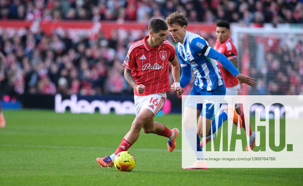 Nicolas Dominguez of Nottingham Forest and Mats Wieffer of Brighton & Hove Albion in action during the Premier league football match between Nottingham Forest and Brighton Hove Albion at City Ground in Nottingham.