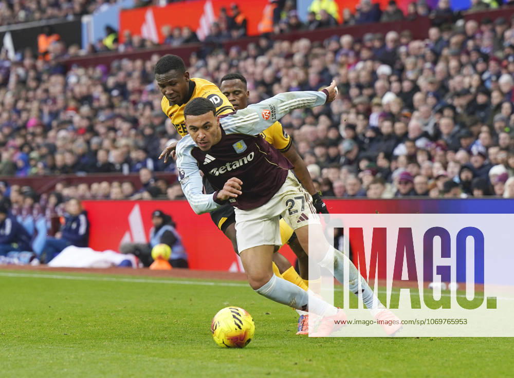 Birmingham, England, 30th November 2025. Morgan Rogers of Aston Villa moves ahead of Yerson Mosquera of Wolverhampton Wanderers during the Aston Villa vs Wolverhampton Wanderers Premier League match at Villa Park, Birmingham. Picture credit should read: Andrew Yates Sportimage . SPI_020_AY_Villa_Wolves SPI-4336-0020