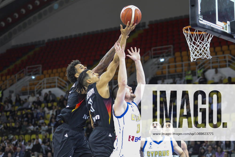 FIBA World Cup Qualifiers : Cyprus vs Germany NORRIS AGBAKOKO of Germany and JOSHUA OBIESIE of Germany compete for the ball with IOANNIS GIANNARAS of Cyprus. Cyprus plays vs Germany for the Group E of the FIBA Basketball World Cup European Qualifiers, at Spyros Kyprianou Arena, Limassol, Cyprus, on Dec. 1, 2025. Limassol Cyprus