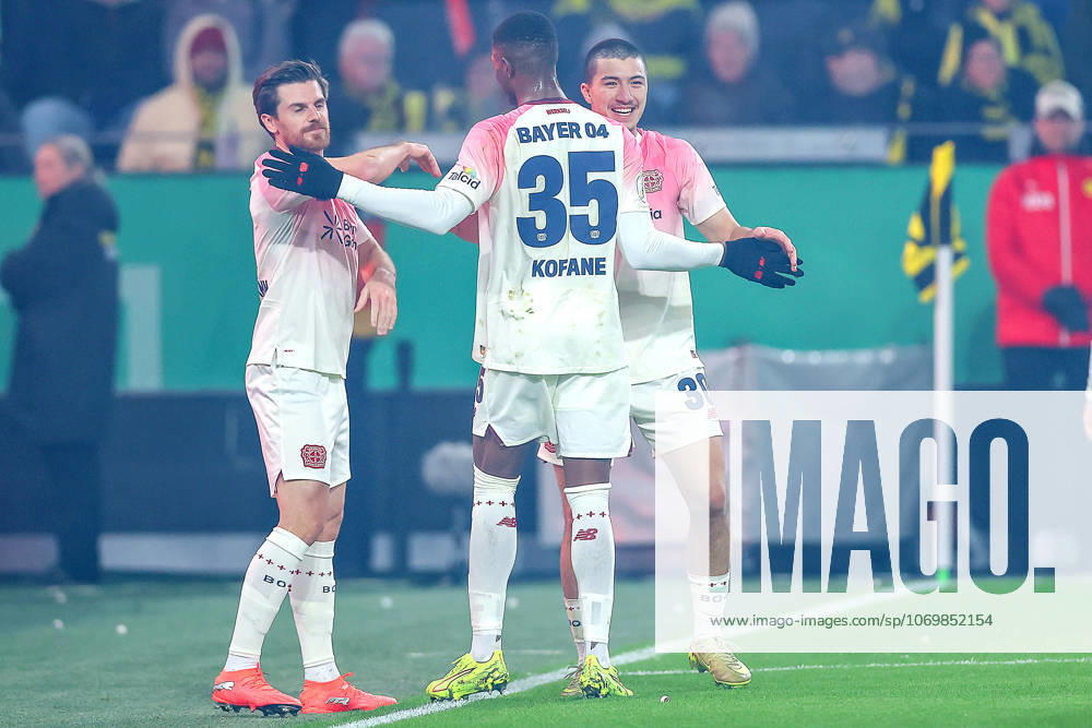 Football, DFB Cup, Borussia Dortmund Bayer 04 Leverkusen, Round of 16, Signal Iduna Park, Season 2025 2026 Goal celebration after the 1-0 goal by scorer Ibrahim Maza Bayer04 30 together with Jonas Hofmann Bayer04 07 and Christian Kofane Bayer04 35 DFB regulations prohibit any use of photographs as image sequences and or quasi video North Rhine-Westphalia Germany