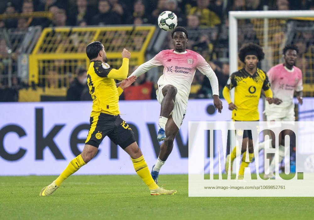 Duel between Ernest POKU Bayer 04 Leverkusen, 19 and Emre CAN Borussia Dortmund, 23 Borussia Dortmund Bayer Leverkusen, DFB Pokal Round of 16 in Dortmund, Signal Iduna Park DFL regulations prohibit any use of photographs as image sequences and or quasi video
