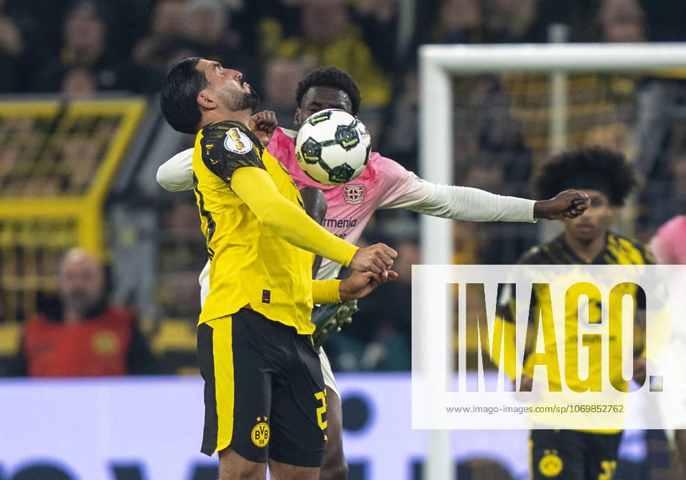 Duel between Ernest POKU Bayer 04 Leverkusen, 19 and Emre CAN Borussia Dortmund, 23 Borussia Dortmund Bayer Leverkusen, DFB Pokal Round of 16 in Dortmund, Signal Iduna Park DFL regulations prohibit any use of photographs as image sequences and or quasi video