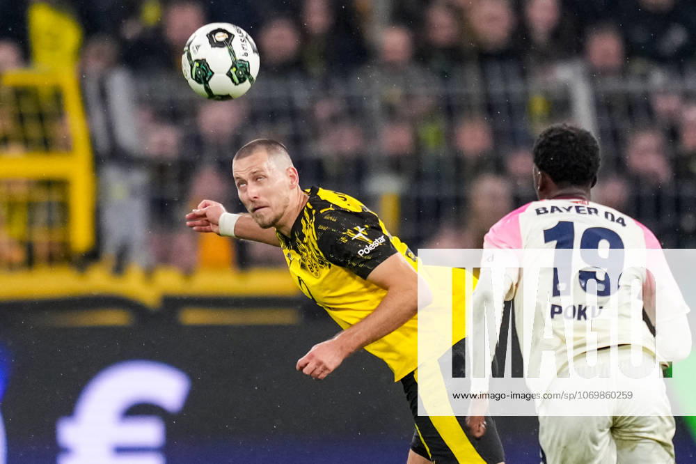 Waldemar Anton of Borussia Dortmund heads the ball during the DFB Cup round of 16 match between Borussia Dortmund and Bayer 04 Leverkusen at Signal Iduna Park on December 2, 2025 in Dortmund, Germany. (Photo by Rene Nijhuis) SPO