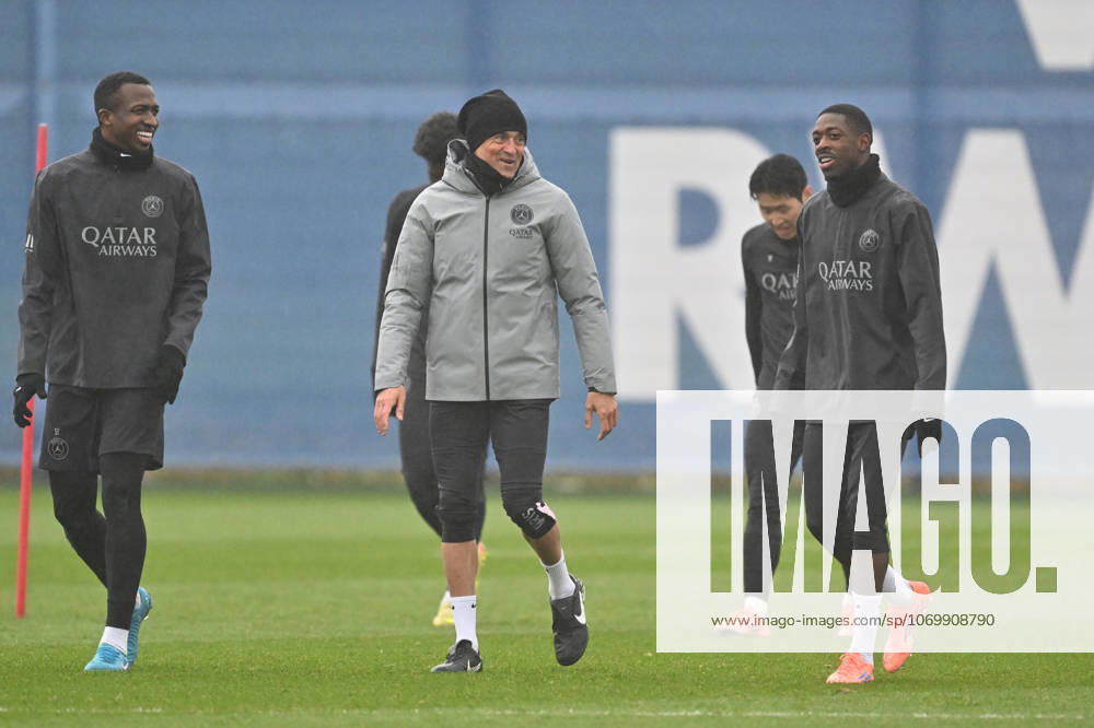 Paris Saint-Germain media day at the PSG Campus POISSY, FRANCE - DECEMBER 04: Head coach of PSG Luis Enrique (C), Ousmane Dembele (R) and Willian Pacho (L) smile during a training session on media day at the PSG Campus in Poissy, west of Paris, France on December 04, 2025. Mustafa Yalcin Anadolu Poissy France. Editorial use only. Please get in touch for any other usage.