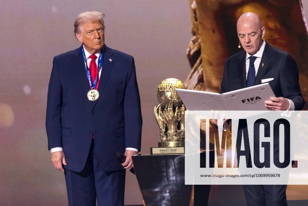 FIFA World Cup, WM, Weltmeisterschaft, Fussball 2026 Official Draw at the John F. Kennedy Center for the Performing Arts U.S. President Donald Trump receives the FIFA Peace Prize from FIFA President Gianni Infantino at the FIFA World Cup 2026 Official Draw at the John F. Kennedy Center for the Performing Arts December 05, 2025 in Washington, DC. The 2026 FIFA World Cup will take place between June 11 and July 19 featuring 48 teams with matches being played in the United States, Mexico and Canada, the first time the international sporting event will be hosted by three nations. WASHINGTON DC UNITED STATES