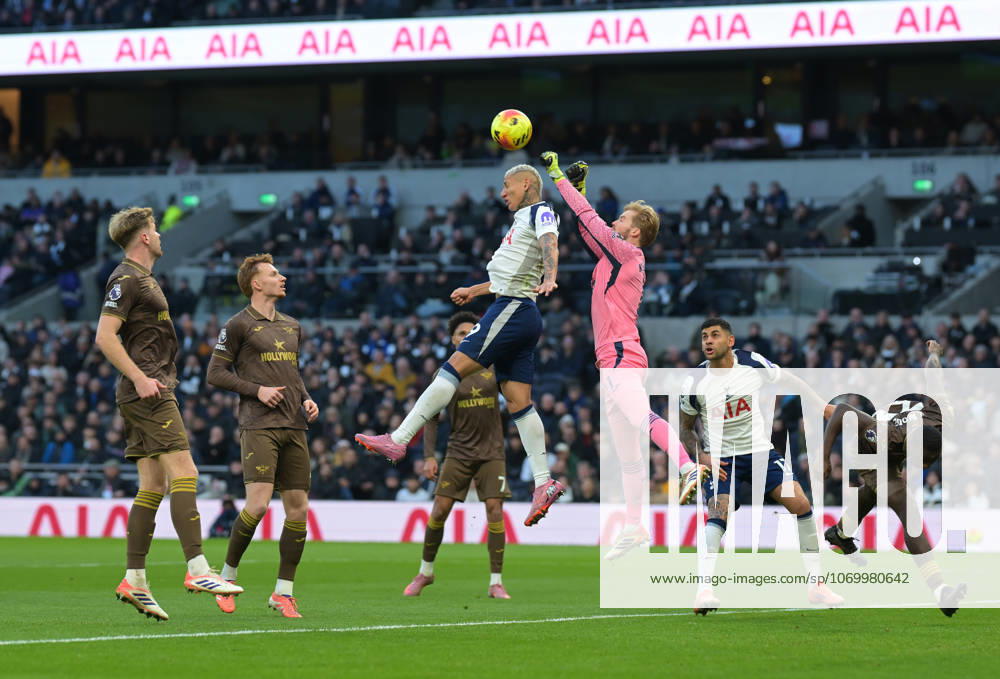 Spurs vs Brentford, Premier League Richarlison of Tottenham Hotspur is cleared by Caoimhin Kelleher of Brentford FCduring the Spurs vs Brentford, Premier League match at the Tottenham Hotspur Stadium London. London Tottenham Hotspur Stadium UK