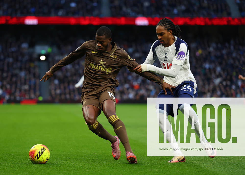 6th December 2025; Tottenham Hotspur Stadium, London, England; Premier League Football, Tottenham Hotspur versus Brentford; Dango Ouattara of Brentford challenged by Djed Spence of Tottenham Hotspur JohnxPatrickxFletcher