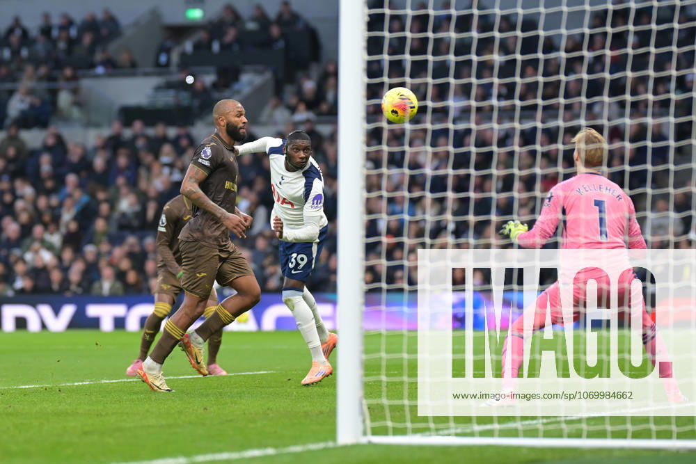 Spurs vs Brentford, Premier League Randal Kolo Muani of Tottenham Hotspur heads close during the Spurs vs Brentford, Premier League match at the Tottenham Hotspur Stadium London. London Tottenham Hotspur Stadium UK