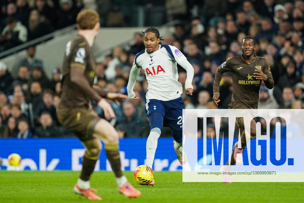 Tottenham Hotspur v Brentford, Premier League Djed Spence of Tottenham Hotspur under pressure from Sepp van den Berg of Brentford and Dango Ouattara of Brentford during the Tottenham Hotspur v Brentford Premier League match at the Tottenham Hotspur Stadium, London, England on 6 December 2025 Credit: Dylan Hepworth Every Second Media Editorial use only. All images are copyright Every Second Media Limited. No images may be reproduced without prior permission. All rights reserved. Premier League and Football League images are subject to licensing agreements with Football DataCo Limited. see https: www.football-dataco.com
