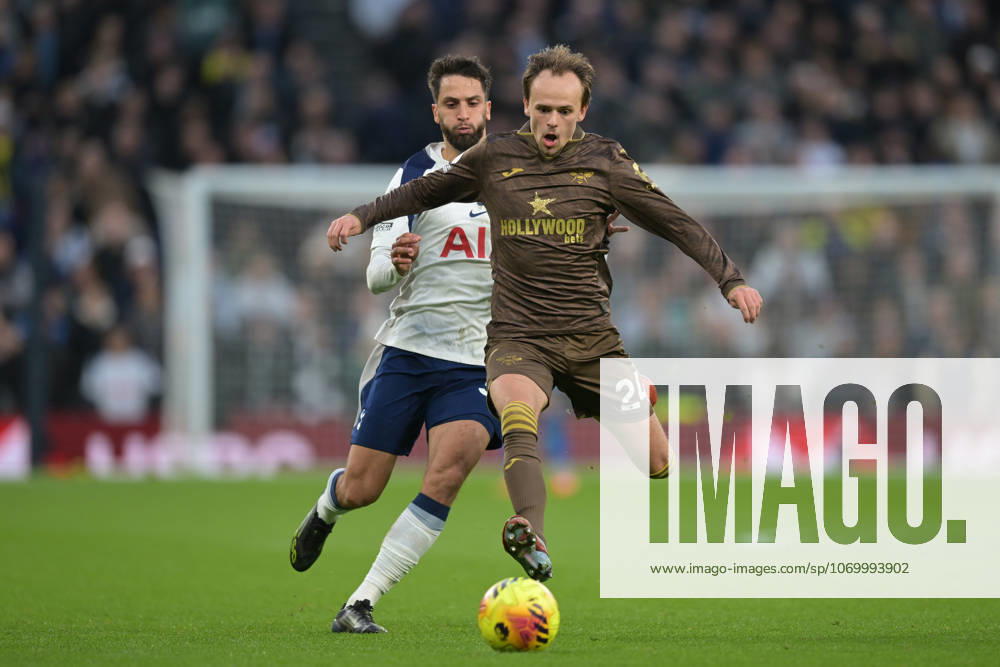 Spurs vs Brentford, Premier League Rodrigo Bentancur of Tottenham Hotspur and Mikkel Damsgaard of Brentford FC during the Spurs vs Brentford, Premier League match at the Tottenham Hotspur Stadium London. London Tottenham Hotspur Stadium UK