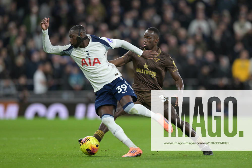 Spurs vs Brentford, Premier League Randal Kolo Muani of Tottenham Hotspur and Michael Kayode of Brentford FC during the Spurs vs Brentford, Premier League match at the Tottenham Hotspur Stadium London. London Tottenham Hotspur Stadium UK