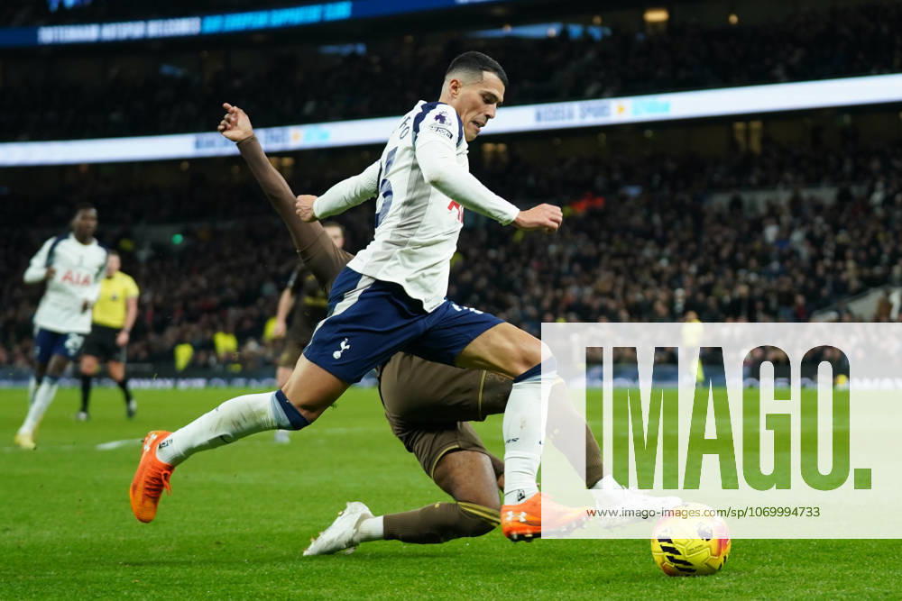 Tottenham Hotspur v Brentford, Premier League Pedro Porro of Tottenham Hotspur battling for the ball Rico Henry of Brentford during the Tottenham Hotspur v Brentford Premier League match at the Tottenham Hotspur Stadium, London, England on 6 December 2025 Credit: Dylan Hepworth Every Second Media Editorial use only. All images are copyright Every Second Media Limited. No images may be reproduced without prior permission. All rights reserved. Premier League and Football League images are subject to licensing agreements with Football DataCo Limited. see https: www.football-dataco.com