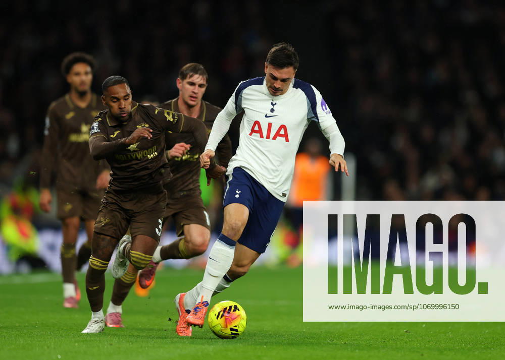 6th December 2025; Tottenham Hotspur Stadium, London, England; Premier League Football, Tottenham Hotspur versus Brentford; Joao Palhinha of Tottenham Hotspur challenged by Rico Henry of Brentford JohnxPatrickxFletcher