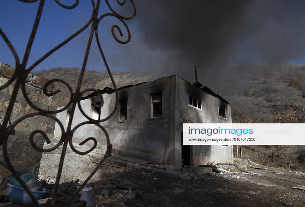NAGORNO-KARABAKH - NOBEMBER 24, 2020: A house left to burn in the village of Nor Karachinar situated within the territory of Kalbajar District bound to return to Azerbaijan. The conflict between Armenia and Azerbaijan over the Nagorno-Karabakh territory rapidly escalated on 27 September. More recently, on 9 November, the leaders of Armenia, Russia and Azerbaijan signed an agreement on a complete ceasefire as well as deployment of the Russian peacekeeping forces in the disputed Caucasus region. Stanislav Krasilnikov TASS TS0EF971