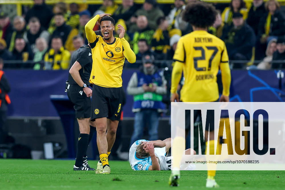 Football, UEFA Champions League, Borussia Dortmund FK Bodö Glimt, BVB Stadion, Matchday 5, Season 2025 2026 Felix Nmecha BVB 08 gesticulating on the pitch next to Ulrik Saltnes Bodo Glimt lying on the ground 14 Regulations prohibit any use of photographs as image sequences and or quasi video North Rhine-Westphalia Germany