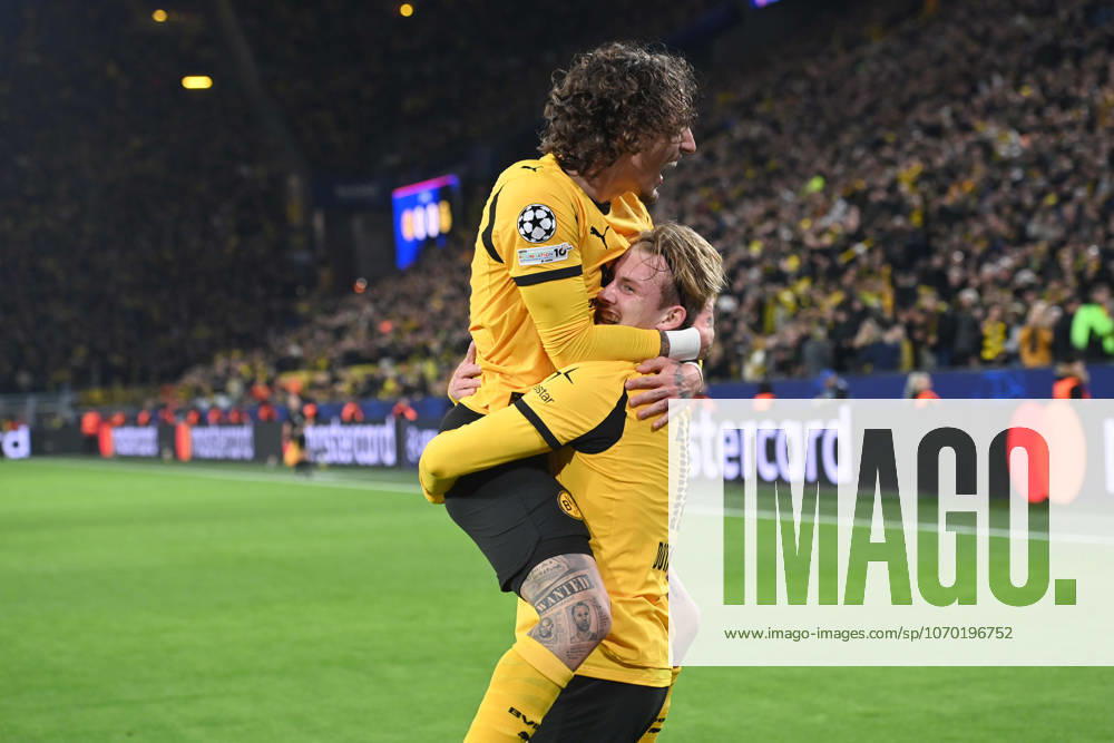 Julian BRANDT DO cheers after his goal for 1 0, cheers, jubilation, joy, cheers, with FABIO SILVA DO Football UEFA Champions League group stage 6 matchday, matchday6, Borussia Dortmund DO FK Bodoe Glimt 2 2 on 10 12 2025 in Dortmund Germany UEFA regulations prohibit any use of photographs as image sequences and or quasi video Â