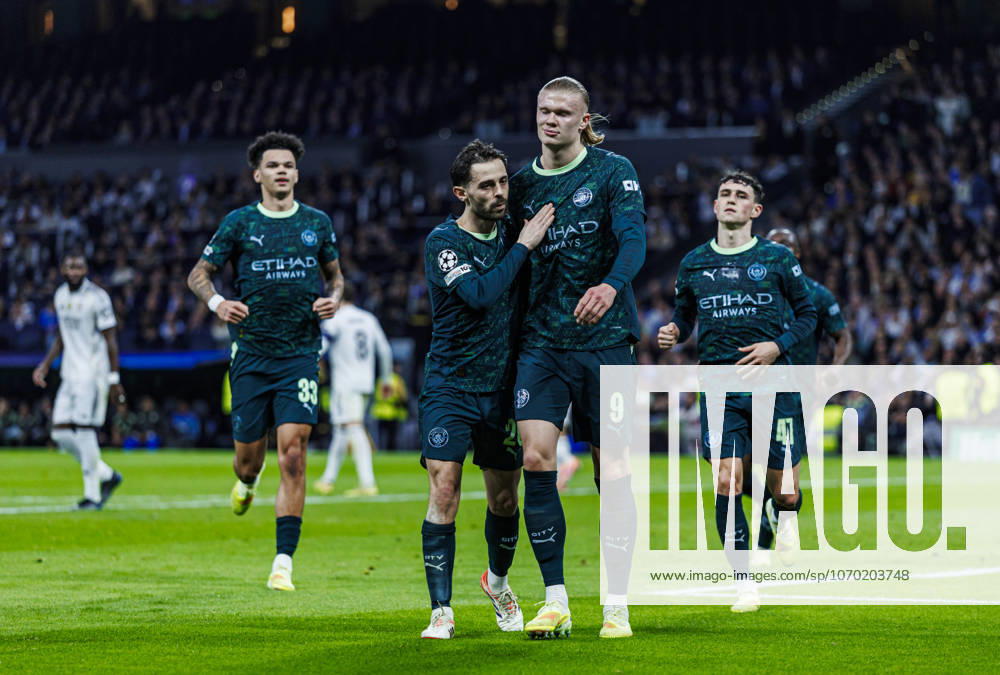 Real Madrid CF vs Manchester City - UEFA Champions League - 10 12 2025 Erling Haaland of Manchester City FC (R) celebrates his goal with Bernardo Silva of Manchester City FC (L) during the UEFA Champions League match between Real Madrid CF and Manchester City at Estadio Santiago Bernabeu on December 10, 2025 in Madrid, Spain. Madrid Spain