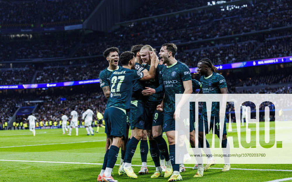 Real Madrid CF vs Manchester City - UEFA Champions League - 10 12 2025 Erling Haaland of Manchester City FC (C) celebrates his goal with Nico Oreailly of Manchester City FC (L) and Matheus Nunes of Manchester City FC (2L) Ruben Dias of Manchester City FC (C) and Nico Gonzalez of Manchester City FC (R) during the UEFA Champions League match between Real Madrid CF and Manchester City at Estadio Santiago Bernabeu on December 10, 2025 in Madrid, Spain. Madrid Spain