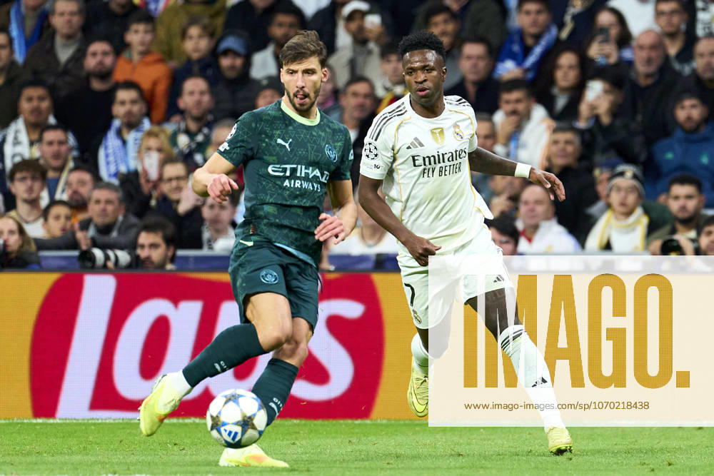 Vinicius Junior of Real Madrid CF battles for the ball with Ruben Dias of Manchester City FC during the UEFA CHAMPIONS LEAGUE match between Real Madrid CF and Manchester City FC at Bernabeu stadium on December 10, 2025. - 10 12 2025 - Spain Madrid Madrid - LGMx Pictorium LePictorium_0321308
