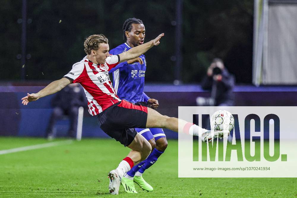 , TenCate Stadion De Herdgang , season 2025 2026 , Dutch Keuken Kampioen Divisie football , match between Jong PSV and Almere City FC , picture shows jong PSV player Eus Waayers and Almere City FC player Junior Kadile Jong PSV - Almere City x200140591x
