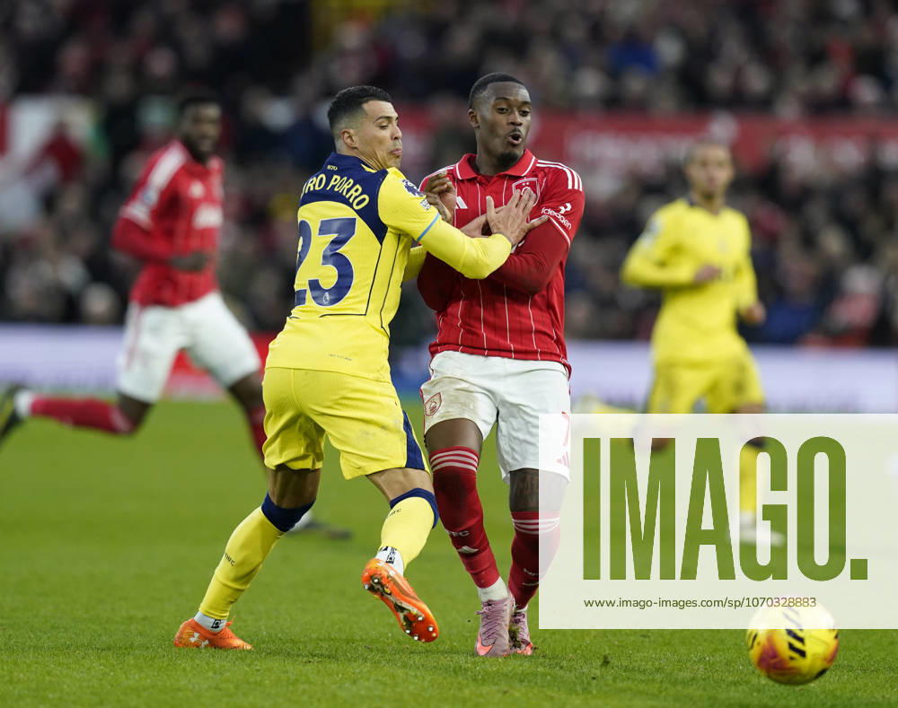 Nottingham, England, 14th December 2025. IPedro Porro of Tottenham challenges Callum Hudson-Odoi of Nottingham Forest during the Nottingham Forest vs Tottenham Hotspur Premier League match at the City Ground, Nottingham. Picture credit should read: Andrew Yates Sportimage . SPI_081_AY_Forest_Spurs SPI-4376-0081