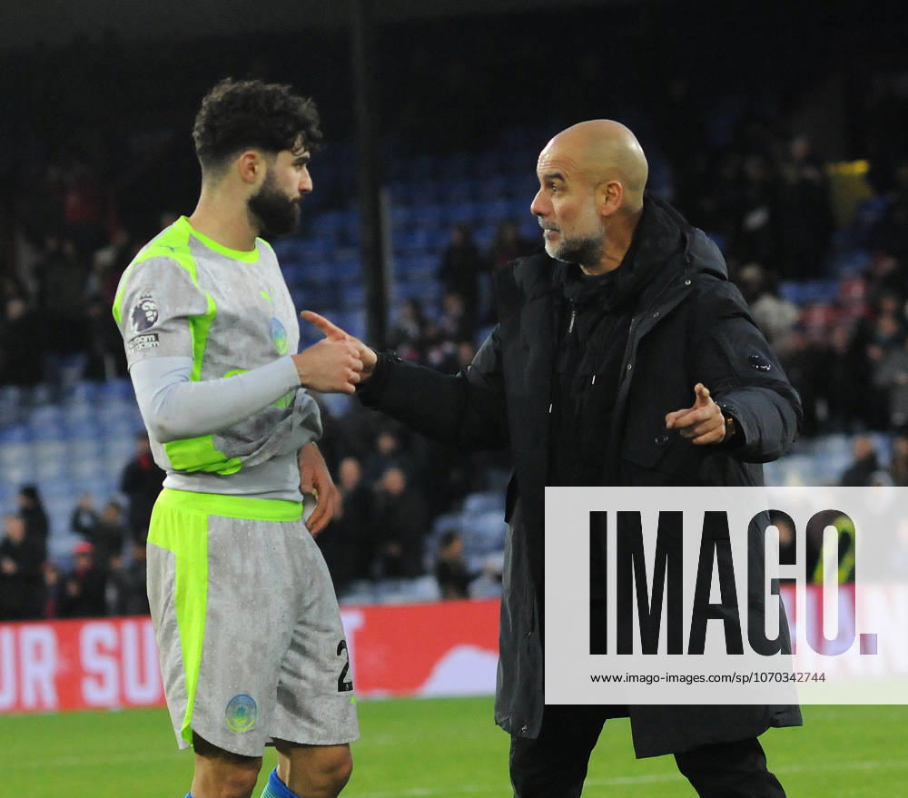 Football - 2025 2026 Premier League - Crystal Palace vs Manchester City - Selhurst Park- Sunday 14th December 2025 Manchester City Manager, Pep Guardiola talks to Ruben Dias after the match