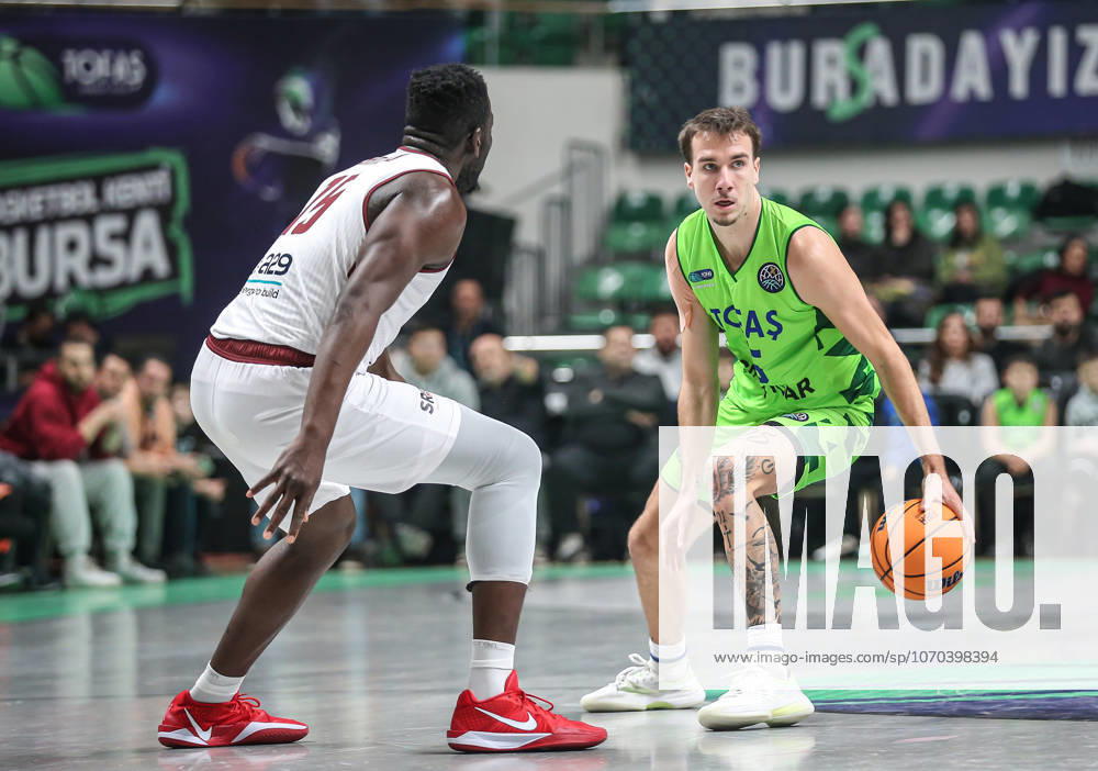 TOFAS v Trapani Shark - Basketball Champions League BURSA, TURKIYE - DECEMBER 16: Besson (R) of TOFAS in action against Sanogo (L) of Trapani Shark during Basketball Champions League Group D week 6 match between TOFAS and Trapani Shark at Tofas Sports Hall in Bursa, Turkiye on December 16, 2025. Fatih Capkin Anadolu Bursa Turkey. Editorial use only. Please get in touch for any other usage.
