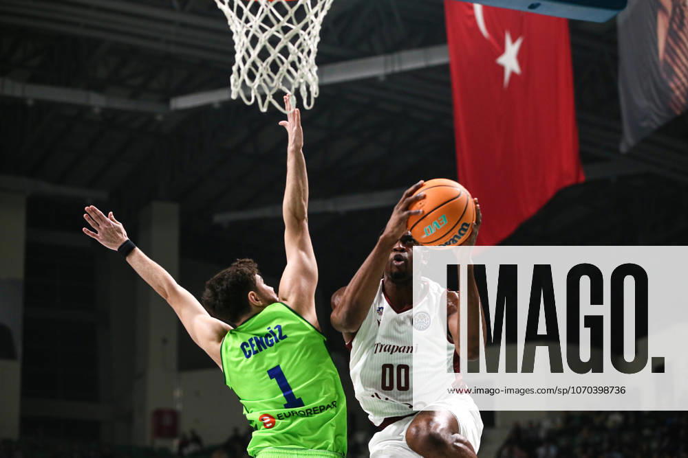 TOFAS v Trapani Shark - Basketball Champions League BURSA, TURKIYE - DECEMBER 16: Eboua (R) of Trapani Shark in action against Ozgur Cengiz (L) of TOFAS during Basketball Champions League Group D week 6 match between TOFAS and Trapani Shark at Tofas Sports Hall in Bursa, Turkiye on December 16, 2025. Saliha Nur Koksal Anadolu Bursa Turkey. Editorial use only. Please get in touch for any other usage.