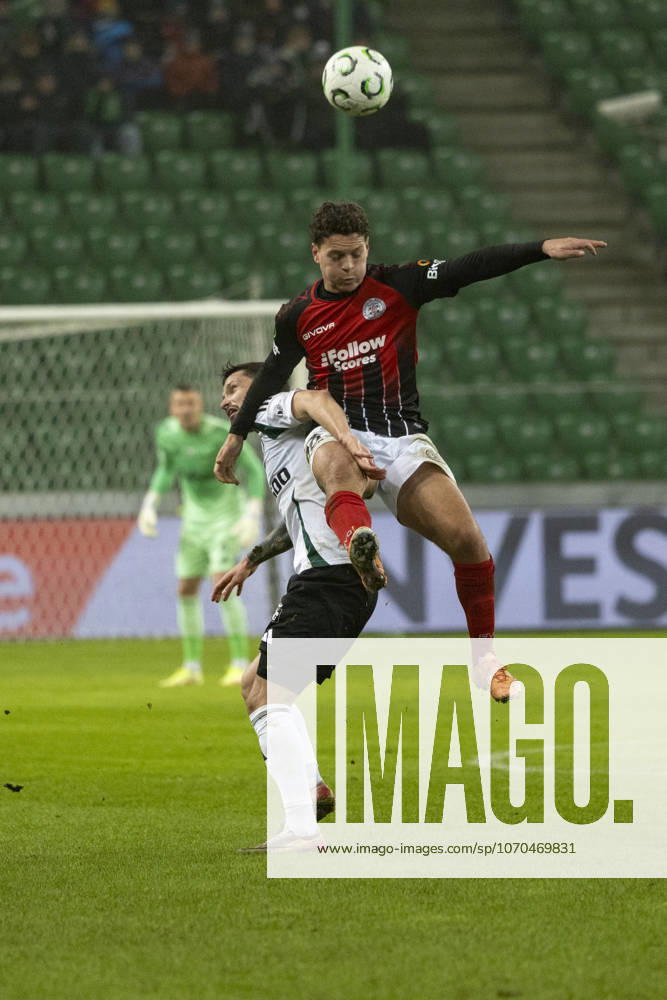 Legia Warszawa - Lincoln Red Imps 18.12.2025 football, Warsaw, UEFA Conference League game Legia Warszawa - Lincoln Red Imps (pilka nozna Liga Konferencji Europy ) image shows: Petar Stojanovic (L) Andre Tjay De Barr (R) photo Katarzyna Plewczynska Fotostyk