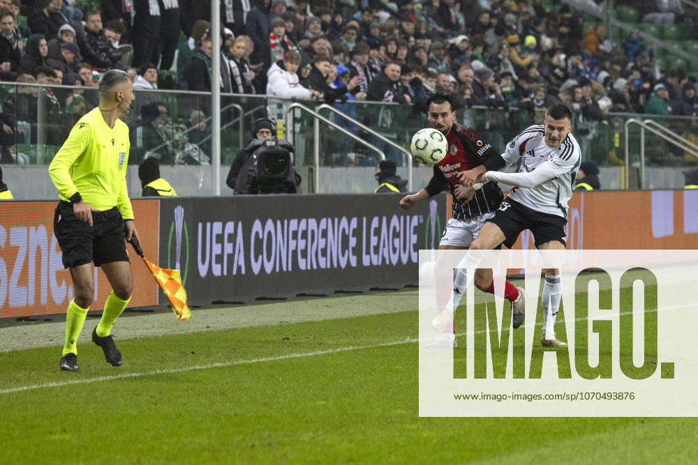 Legia Warszawa - Lincoln Red Imps 18.12.2025 football, Warsaw, UEFA Conference League game Legia Warszawa - Lincoln Red Imps (pilka nozna Liga Konferencji Europy ) image shows: Rafael Munoz (C) Arkadiusz Reca (R) photo Katarzyna Plewczynska Fotostyk
