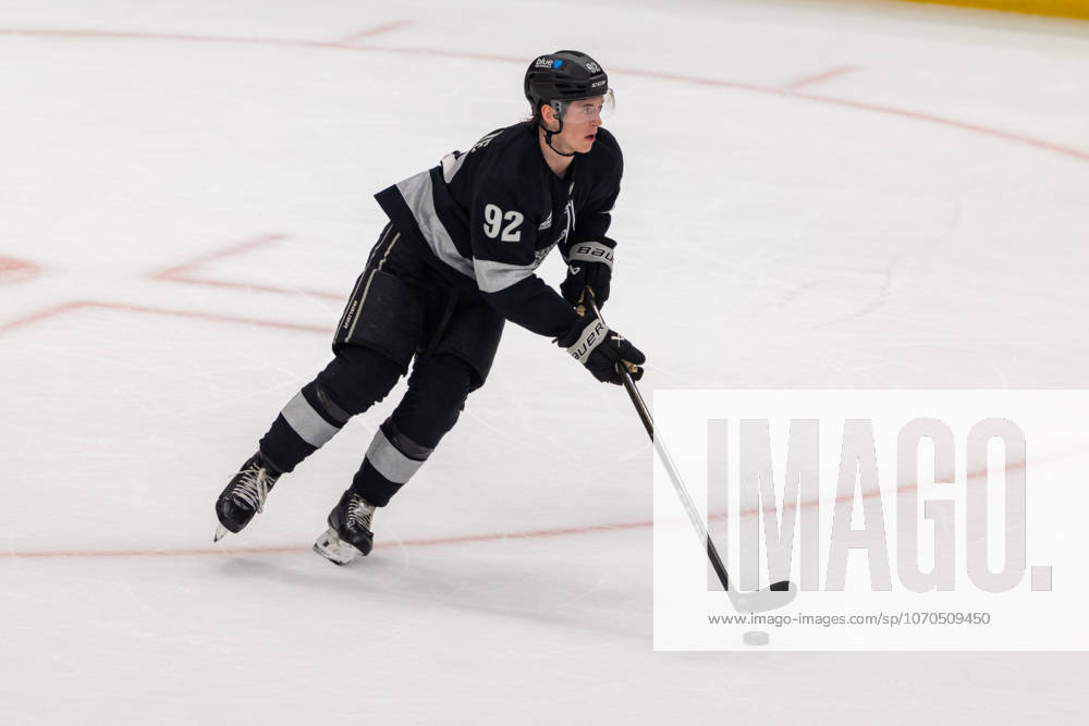 LOS ANGELES, CALIFORNIA - DECEMBER 13: Defenseman Brandt Clarke 92 of the Los Angeles Kings skates with the puck during a game between the Calgary Flames and Los Angeles Kings at Crypto.com Arena on December 13, 2025, in Los Angeles, California. Calgary Flames V Los Angeles Kings - ZUMAt139 20251213_aaa_t139_010