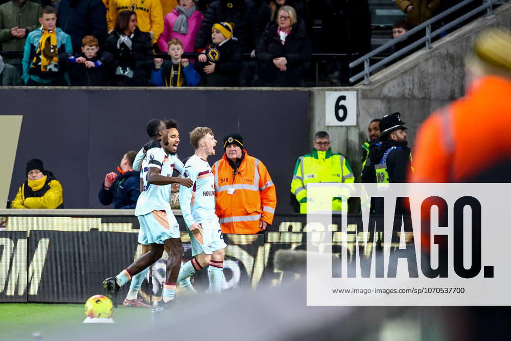 Wolverhampton Wanderers v Brentford - Premier League Brentford FC 23 Keane Lewis-Potter (right) receives congratulations for the goal during the Premier League match between Wolverhampton Wanderers and Brentford at Molineux in Wolverhampton, England, on December 20, 2025. Wolverhampton West Midlands United Kingdom