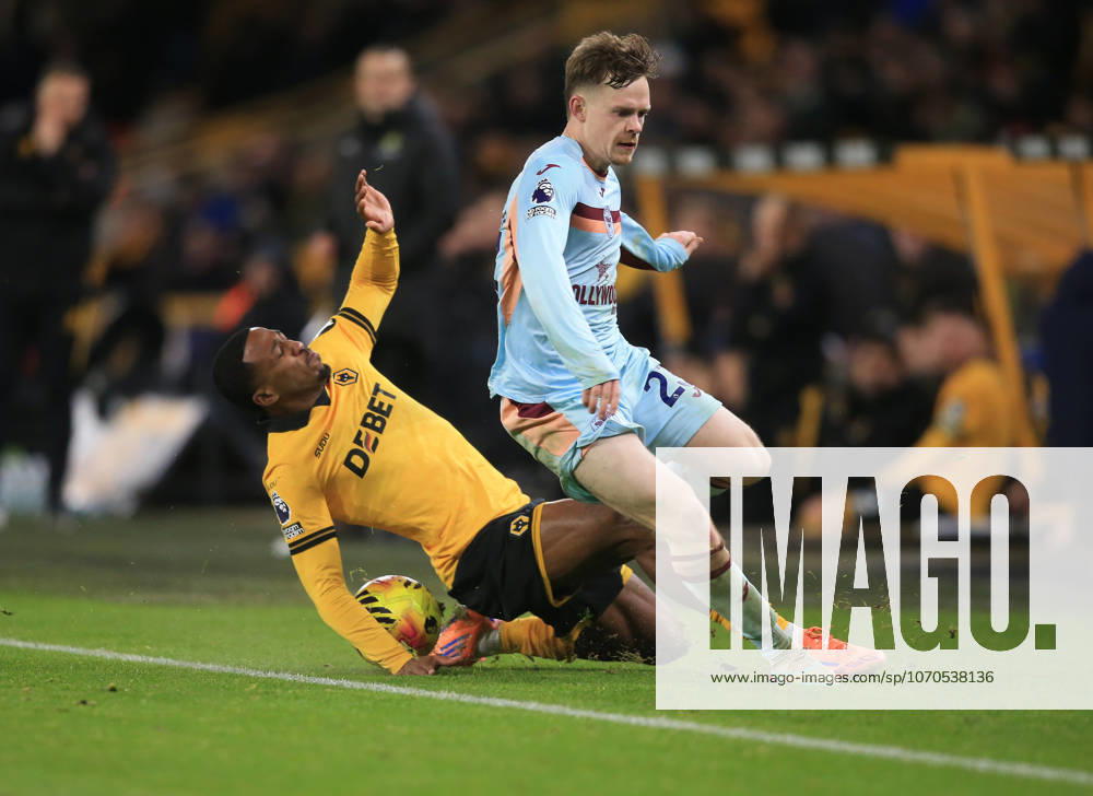 Jackson Tchatchoua of Wolverhampton Wanderers (L) tackles Keane Lewis-Potter of Brentford. Wolverhampton Wanderers v Brentford, Premier League, Football, Molineux, Wolverhampton, UK - 20 Dec 2025Wolverhampton Molineux United Kingdom