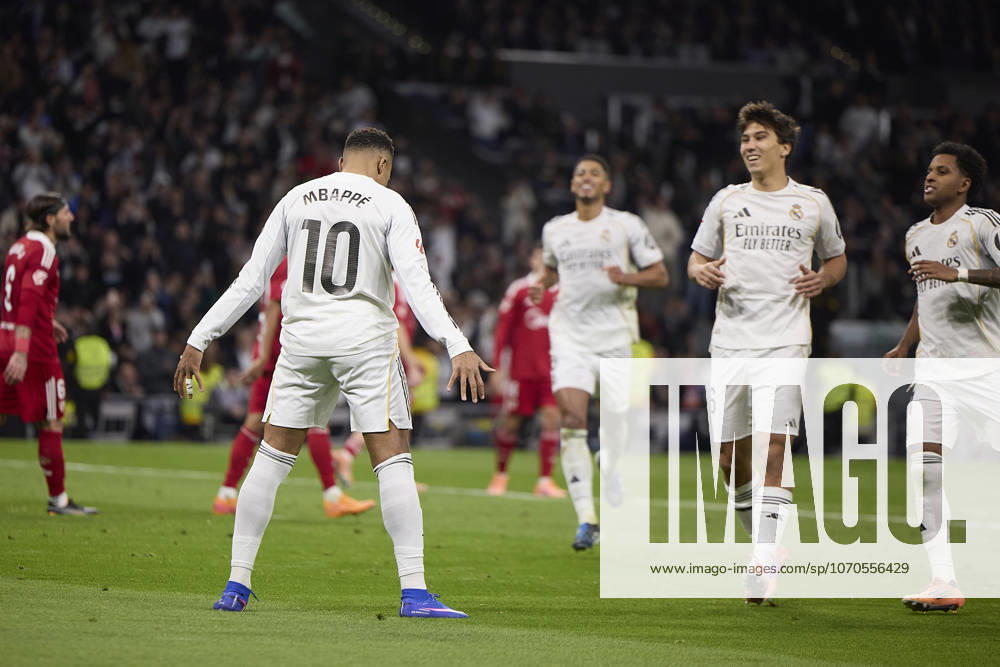 Kylian Mbappe Real Madrid CF celebrates after scoring his team˜s second goal during the LaLiga EA Sports match between Real Madrid v Sevilla FC at Santiago BernabÃ u on December 20, 2025 in Madrid, Spain Photo by Manu Reino DeFodi Images