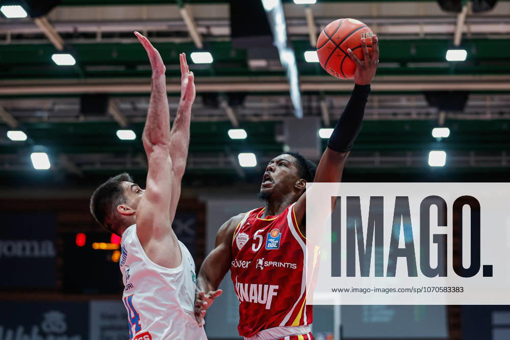 In the picture from left Jure Planinic Syntainics MBC, 44 against Marcus Carr Wuerzburg Baskets, 5 21 12 2025, Basketball, Fitness First Wuerzburg Baskets vs SYNTAINICS MBC, easyCredit BBL, 11 Matchday, Germany, Wuerzburg, tectake Arena,