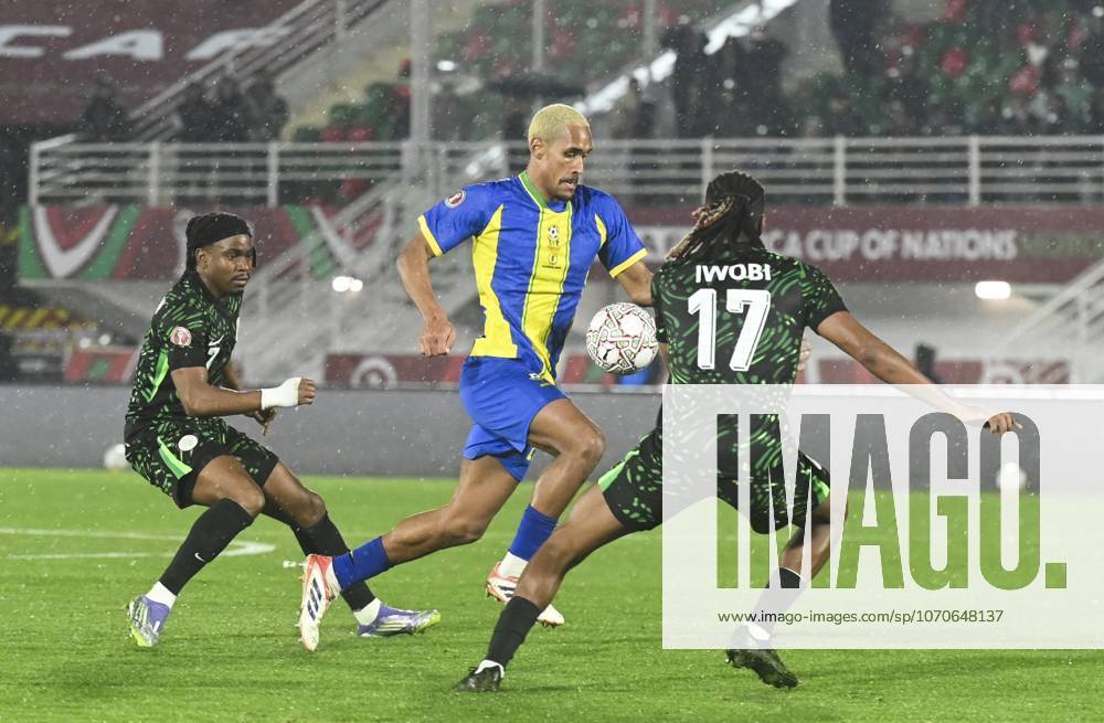 Nigeria v Tanzania - Africa Cup of Nations FEZ, MOROCCO - DECEMBER 23: Ademola Lookman (L) and Alex Iwobi (R) of Nigeria in action against Haji Mnoga (C) of Tanzania during 35th Africa Cup of Nations (AFCON 2025) Group C match between Nigeria and Tanzania at Complexe Sportif de Fes Stadium in Fez, Morocco on December 23, 2025. Stringer Anadolu Fez Morocco. Editorial use only. Please get in touch for any other usage.