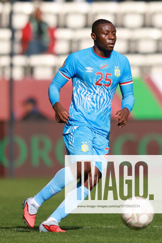 Morocco, Rabat - 23 December 2025 - Edo Kayembe of DR Congo national team, Nationalteam full length, Freisteller body in home kit during the Africa Cup of Nations 2025 match of group D between DR Congo national team and Benin national team at Al-Barid Stadium, Rabat, Morocco. AFCON 2025 - Democratic Republic of the Congo vs. Benin