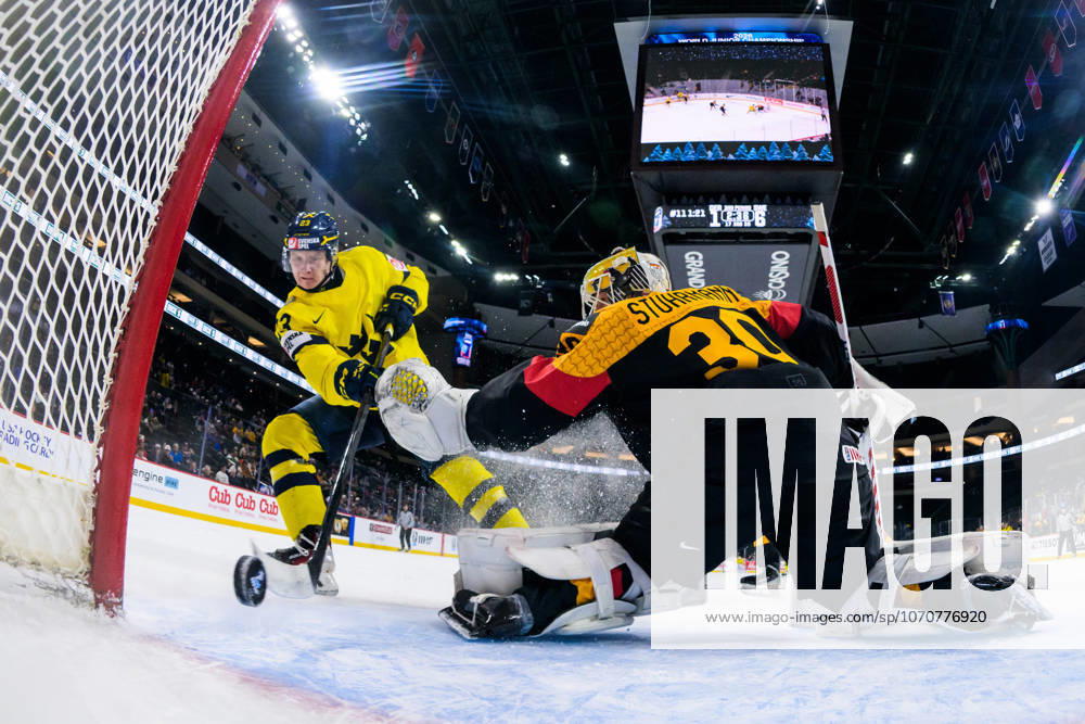 Liam Danielsson of Sweden scores the 1 7 goal behind goaltender Lukas Stuhrmann of Germany during the 2026 IIHF World Junior Championship game between Germany and Sweden on December 29, 2025 in Saint Paul Photo Joel Marklund BILDBYRAN kod JM JM0764 bbeng ishockey ice hockey jvm junior vm u20 2026 iihf world junior championship world juniors deutschland germany sverige sweden