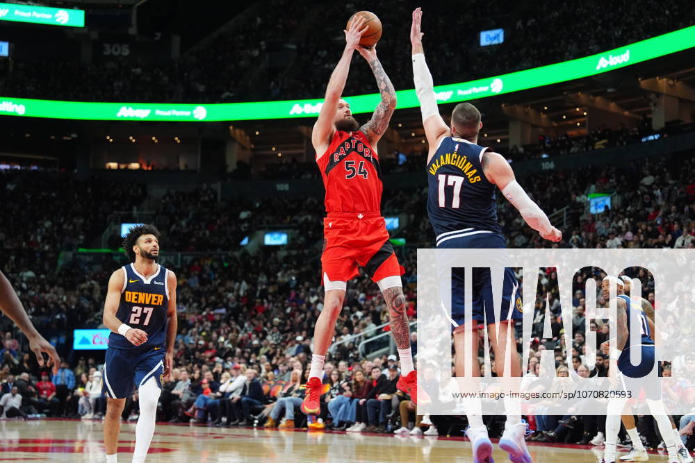 Toronto Raptors forward centre Sandro Mamukelashvili (54) shoots over Denver Nuggets centre Jonas ValanÄÂiA«nas (17) during second half NBA, Basketball Herren, USA action in Toronto on Wednesday December 31, 2025. Canada News - December 31, 2025 - ZUMAc35_ 20251231_zaf_c35_055