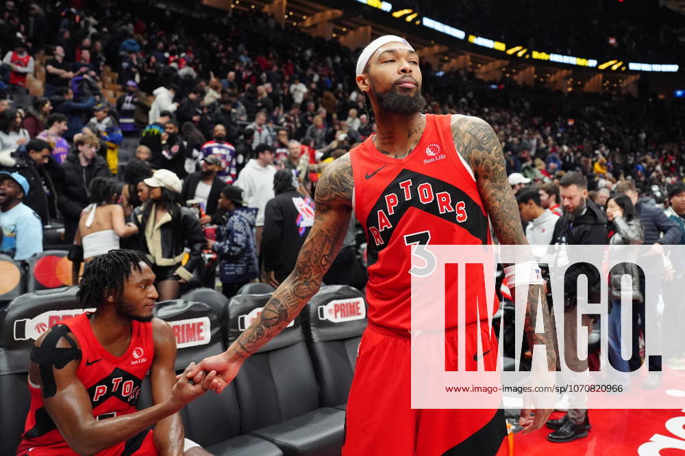 Toronto Raptors forward Brandon Ingram (3) and teammate Immanuel Quickley (5) react after Ingram s basket against the Denver Nuggets was ruled that it came after the game clock sounded in NBA, Basketball Herren, USA action in Toronto on Wednesday December 31, 2025. Canada News - December 31, 2025 - ZUMAc35_ 20251231_zaf_c35_071